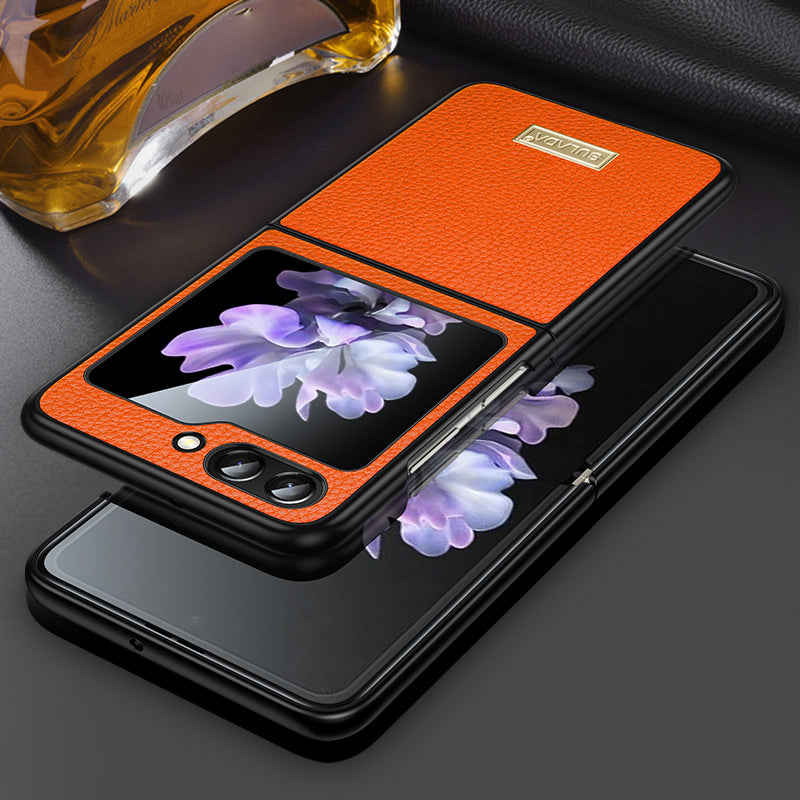 Uniqkart For Samsung Galaxy Z Flip5 5G Slim-Fit Phone Case PU Leather Coated PC + TPU Litchi Texture Cover - Orange
