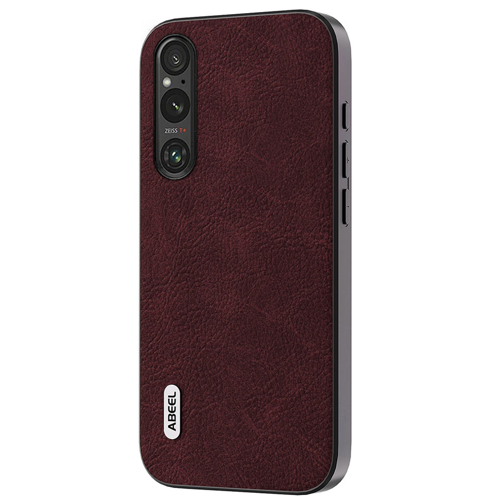 Uniqkart Back Protector for Sony Xperia 1 IV 5G PU Leather+PC+TPU Litchi Texture Scratch Proof Phone Case - Purplish Red