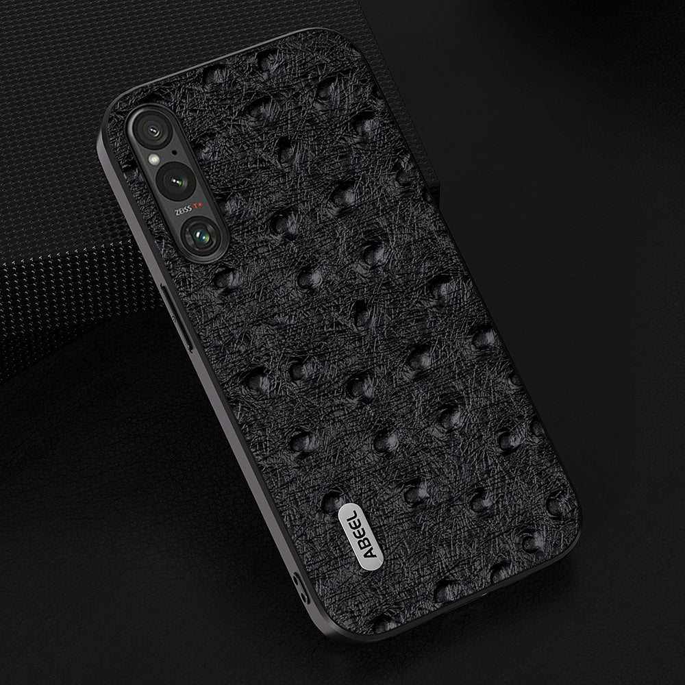 Uniqkart For Sony Xperia 1 V Ostrich Texture Genuine Cow Leather Coated Phone Case PC+TPU Back Cover - Black