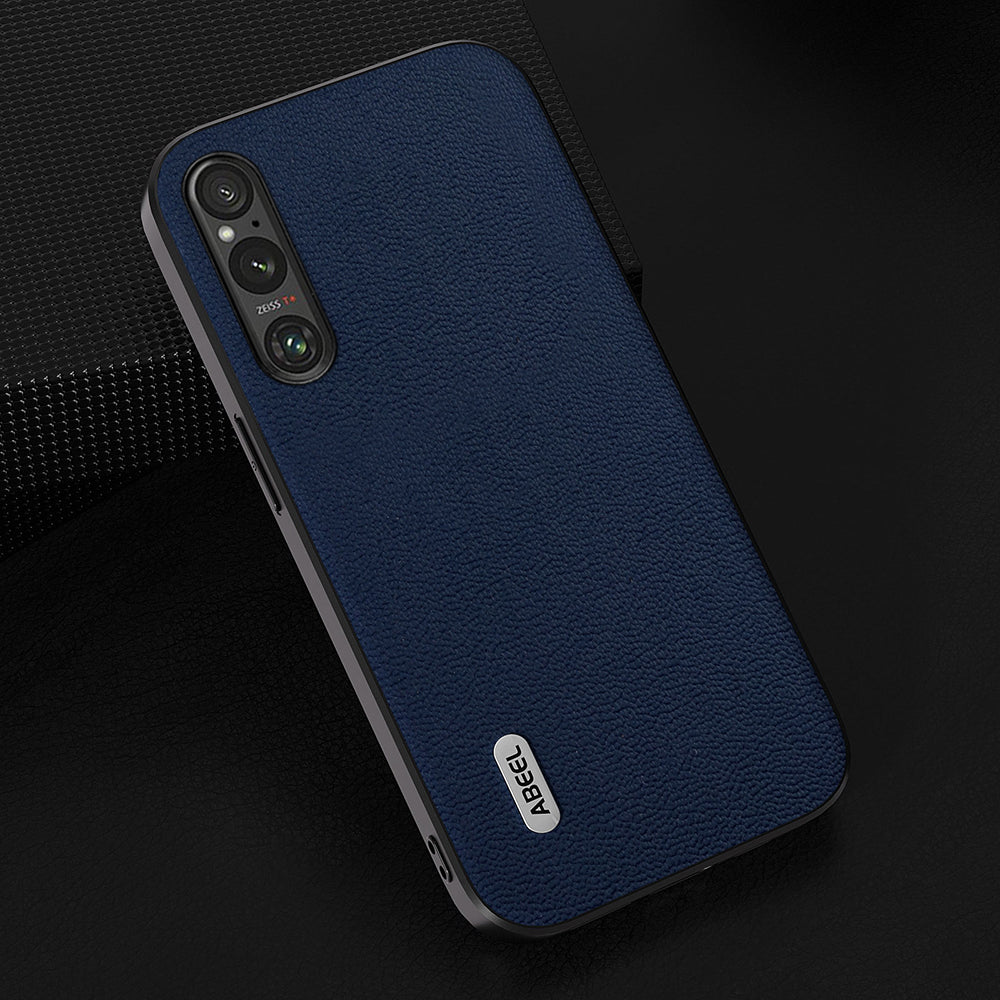 Uniqkart For Sony Xperia 1 V PC+TPU Genuine Cow Leather Coated Cover Litchi Texture Phone Case - Blue