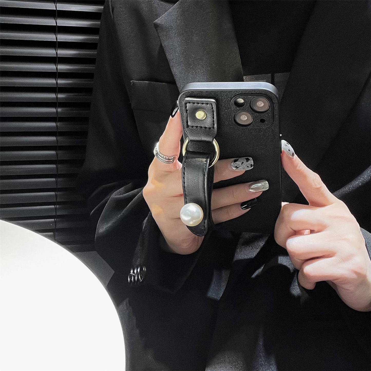 Uniqkart for iPhone 13 PU Leather+TPU Phone Case Pearl Decor Wristband Drop Protection Black Phone Back Shell