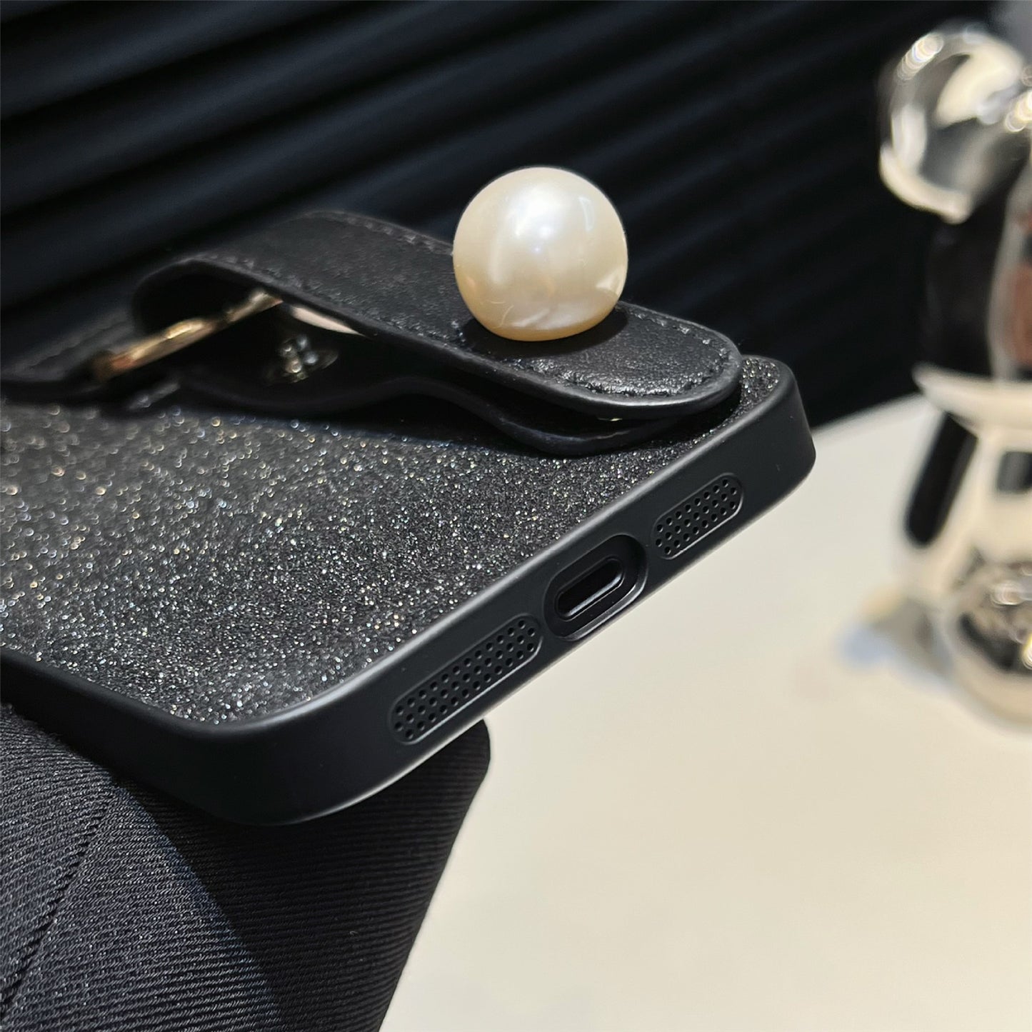 Uniqkart for iPhone 13 PU Leather+TPU Phone Case Pearl Decor Wristband Drop Protection Black Phone Back Shell