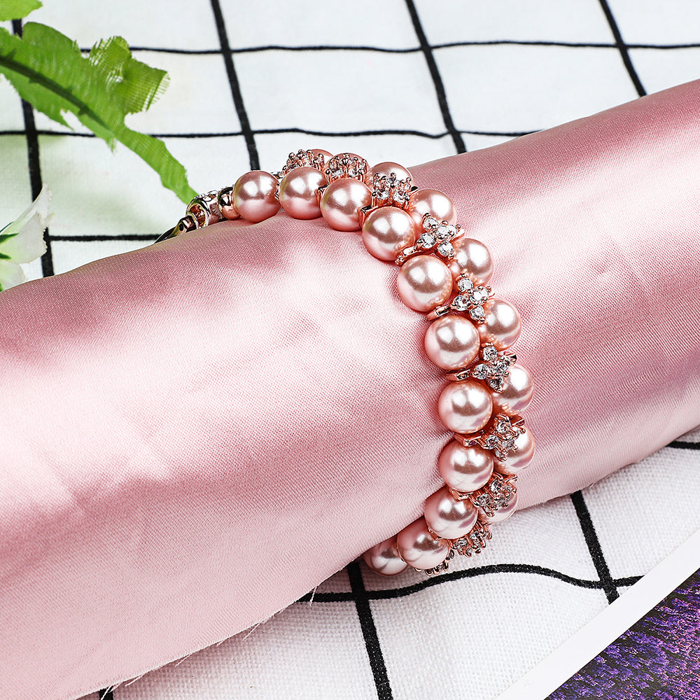 Faux Pearl Rhinestone Decor Wrist Strap Smart Watch Band Bracelet for Apple Watch Series 8 41mm / Series 7 41mm / Series 6 / 5 / 4 / SE / SE(2022) 40mm Series 3 / 2 / 1 38mm - Rose Gold