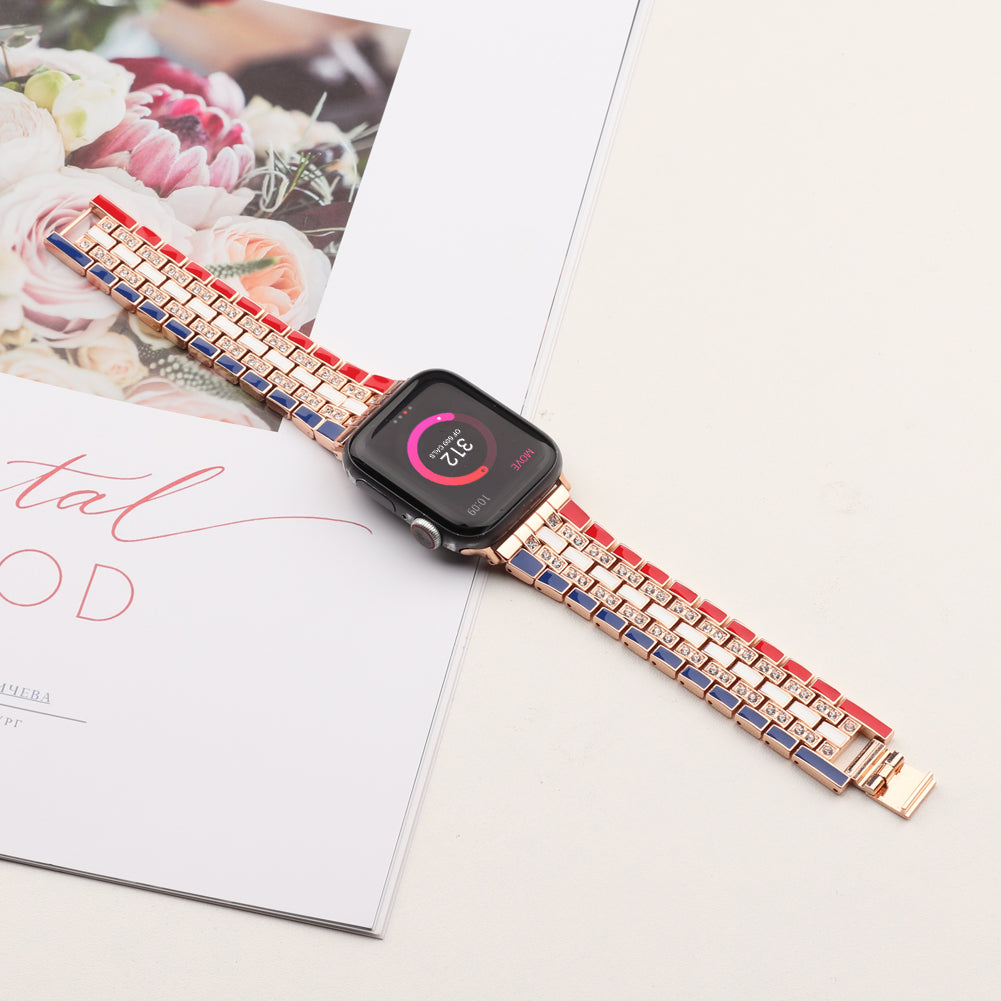 for Apple Watch Ultra 49mm / Series 8 45mm / 7 45mm / Series 6 / 5 / 4 / SSE 44mm / SE (2022) 44mm / Series 3 / 2 / 1 42mm Flag Style Watch Strap Rhinestone Band Replacement - Red / Blue / Rose Gold