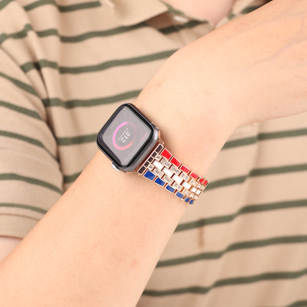 for Apple Watch Series 8 41mm / Series 7 41mm / Series 6 / 5 / 4 / SE / SE(2022) 40mm / Series 3 / 2 / 1 38mm Rhinestone Decor Flag Style Wrist Strap Smart Watch Band - Red / Blue / Rose Gold