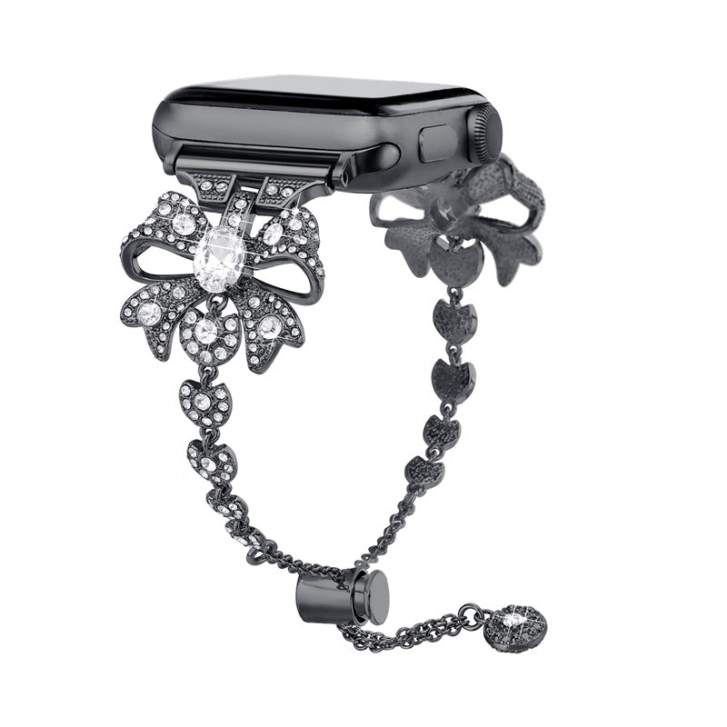 for Apple Watch Series 8 / 7 41mm / 6 / 5 / 4 / SE / SE (2022) 40mm / 3 / 2 / 1 38mm Rhinestones Decor Bowknot Bracelet Metal Watch Strap Adjustable Wrist Band - Black