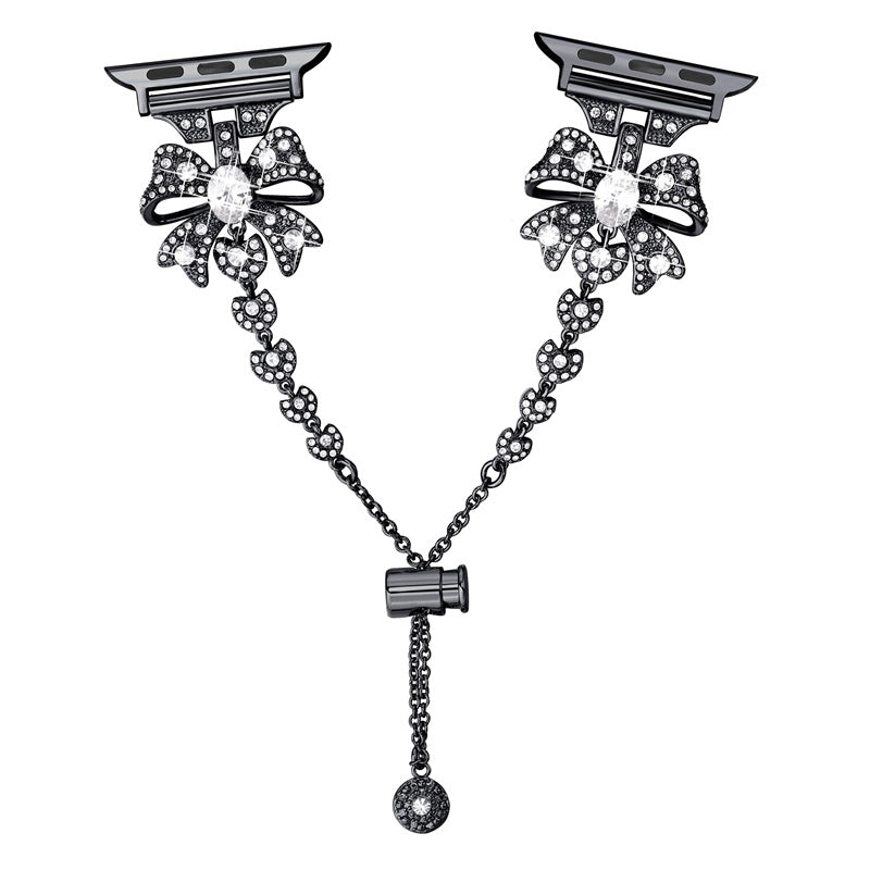 for Apple Watch Series 8 / 7 41mm / 6 / 5 / 4 / SE / SE (2022) 40mm / 3 / 2 / 1 38mm Rhinestones Decor Bowknot Bracelet Metal Watch Strap Adjustable Wrist Band - Black