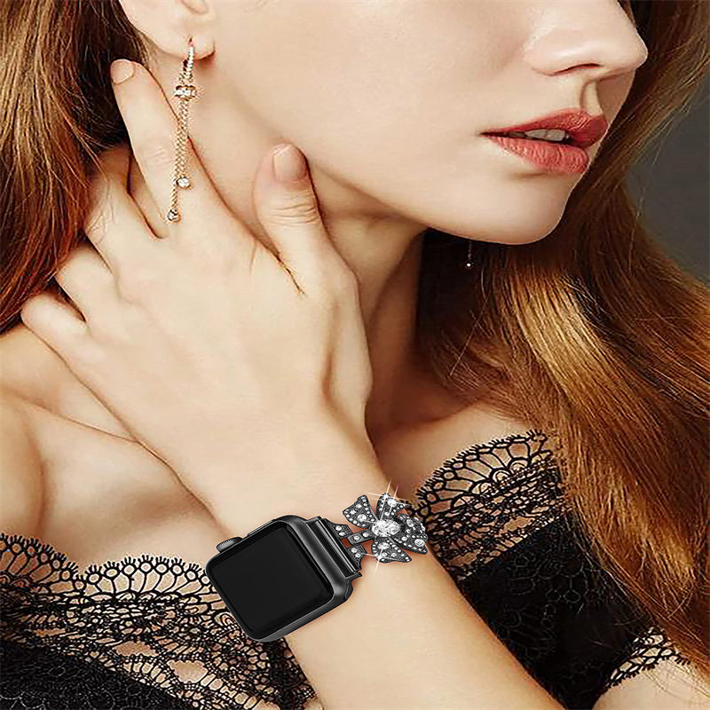 for Apple Watch Series 8 / 7 41mm / 6 / 5 / 4 / SE / SE (2022) 40mm / 3 / 2 / 1 38mm Rhinestones Decor Bowknot Bracelet Metal Watch Strap Adjustable Wrist Band - Black