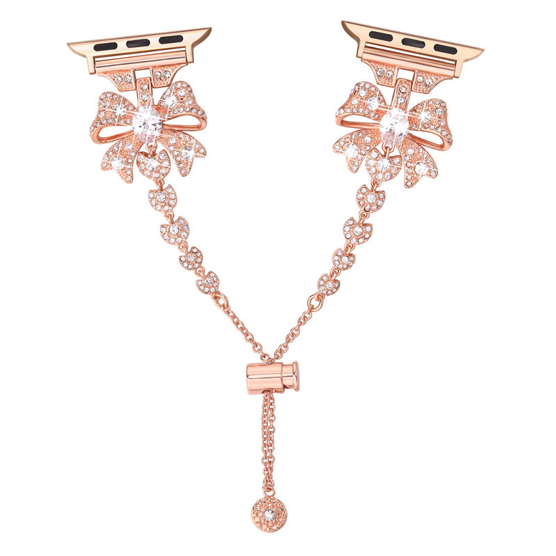 for Apple Watch Series 8 / 7 41mm / 6 / 5 / 4 / SE / SE (2022) 40mm / 3 / 2 / 1 38mm Rhinestones Decor Bowknot Bracelet Metal Watch Strap Adjustable Wrist Band - Rose Gold