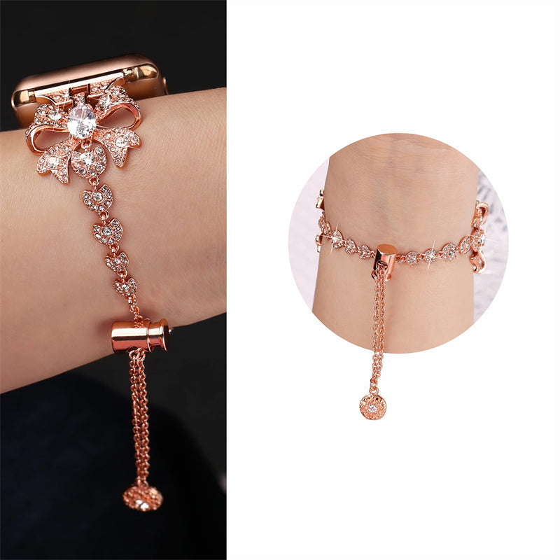 for Apple Watch Series 8 / 7 41mm / 6 / 5 / 4 / SE / SE (2022) 40mm / 3 / 2 / 1 38mm Rhinestones Decor Bowknot Bracelet Metal Watch Strap Adjustable Wrist Band - Rose Gold