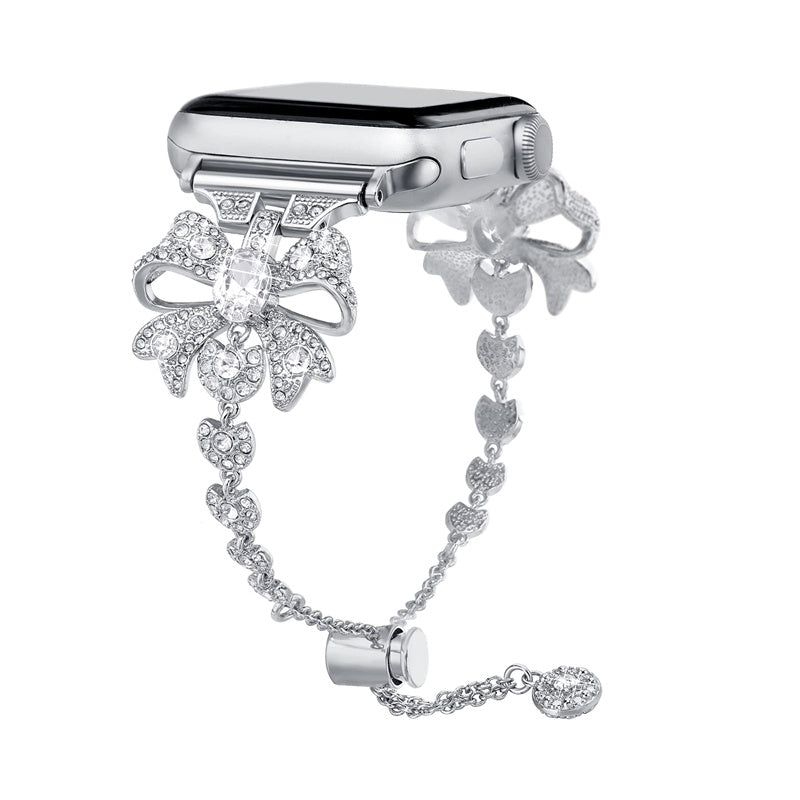 for Apple Watch Series 8 / 7 41mm / 6 / 5 / 4 / SE / SE (2022) 40mm / 3 / 2 / 1 38mm Rhinestones Decor Bowknot Bracelet Metal Watch Strap Adjustable Wrist Band - Silver