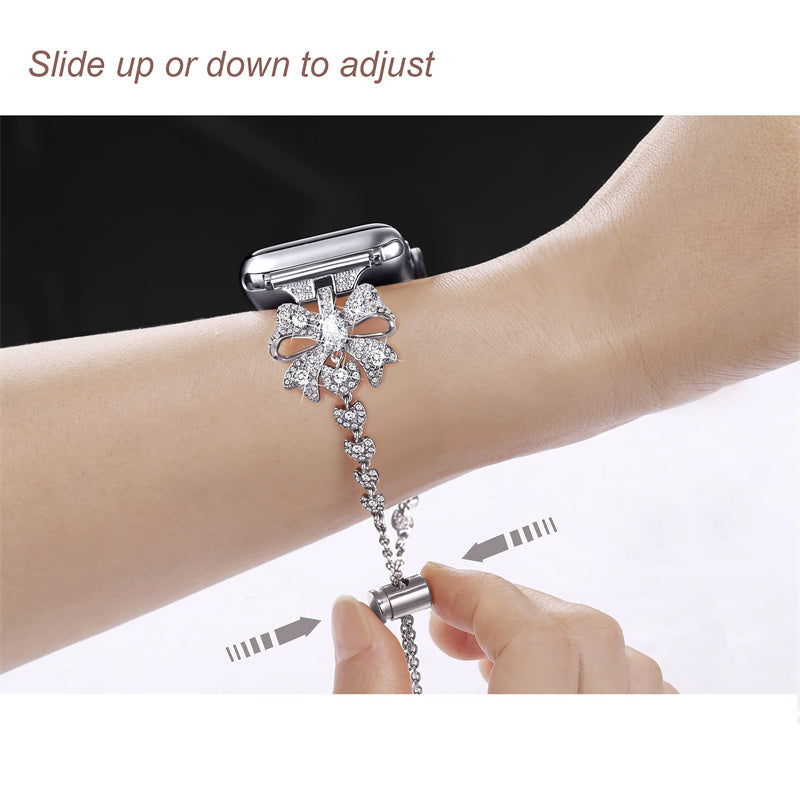for Apple Watch Series 8 / 7 41mm / 6 / 5 / 4 / SE / SE (2022) 40mm / 3 / 2 / 1 38mm Rhinestones Decor Bowknot Bracelet Metal Watch Strap Adjustable Wrist Band - Silver