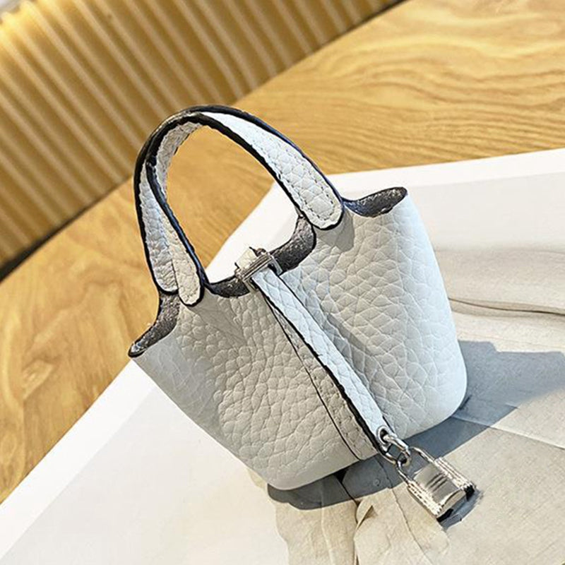 for Apple AirPods 3 / Pro / Pro 2 / AirPods with Charging Case (2016) / (2019) / AirPods with Wireless Charging Case (2019) Shockproof Cover Cowhide Leather Protective Case with Strap - White