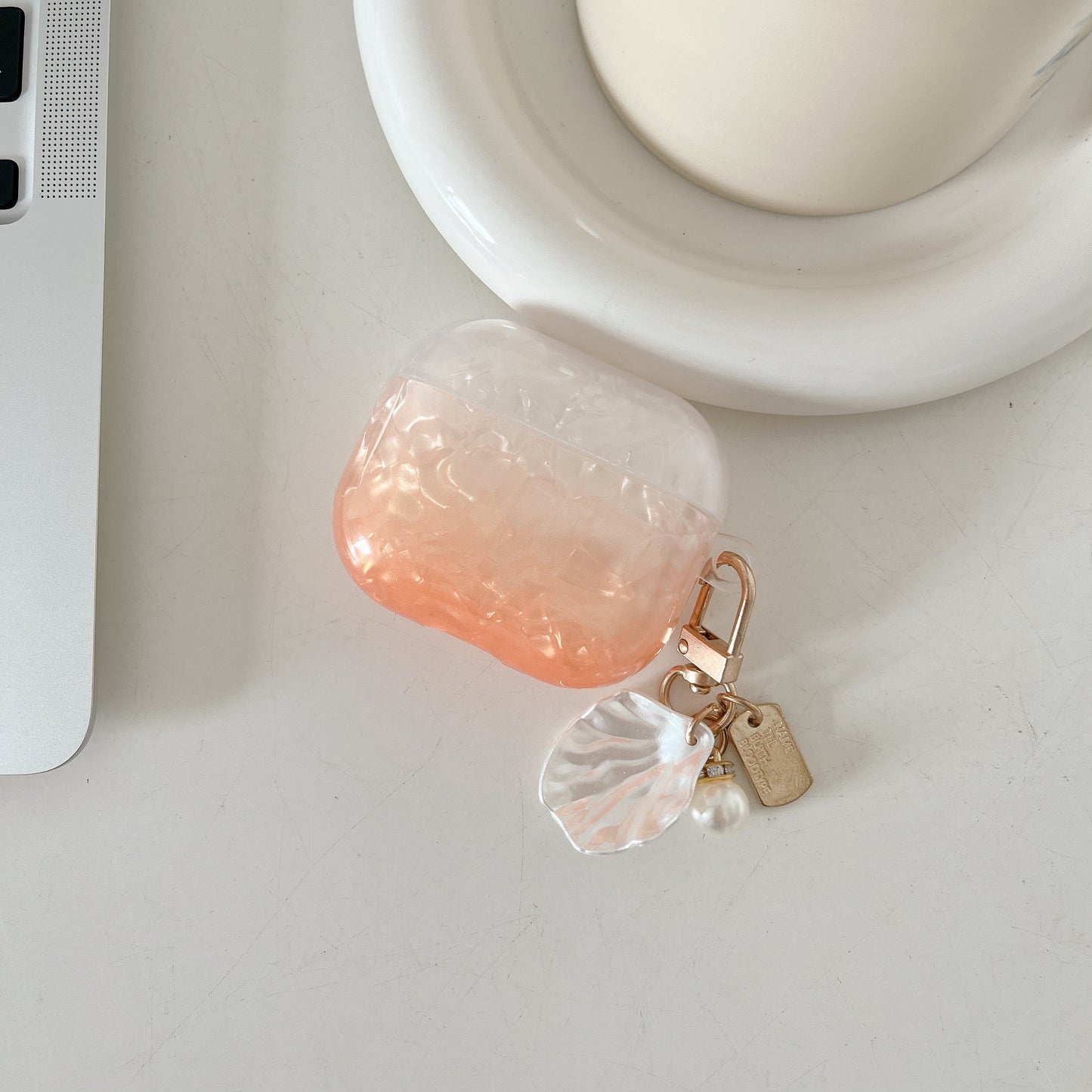 Uniqkart for AirPods Pro 2 Gradient Shell Grain TPU Case Shockproof Earphone Cover with Shell Shape Pendant - Orange