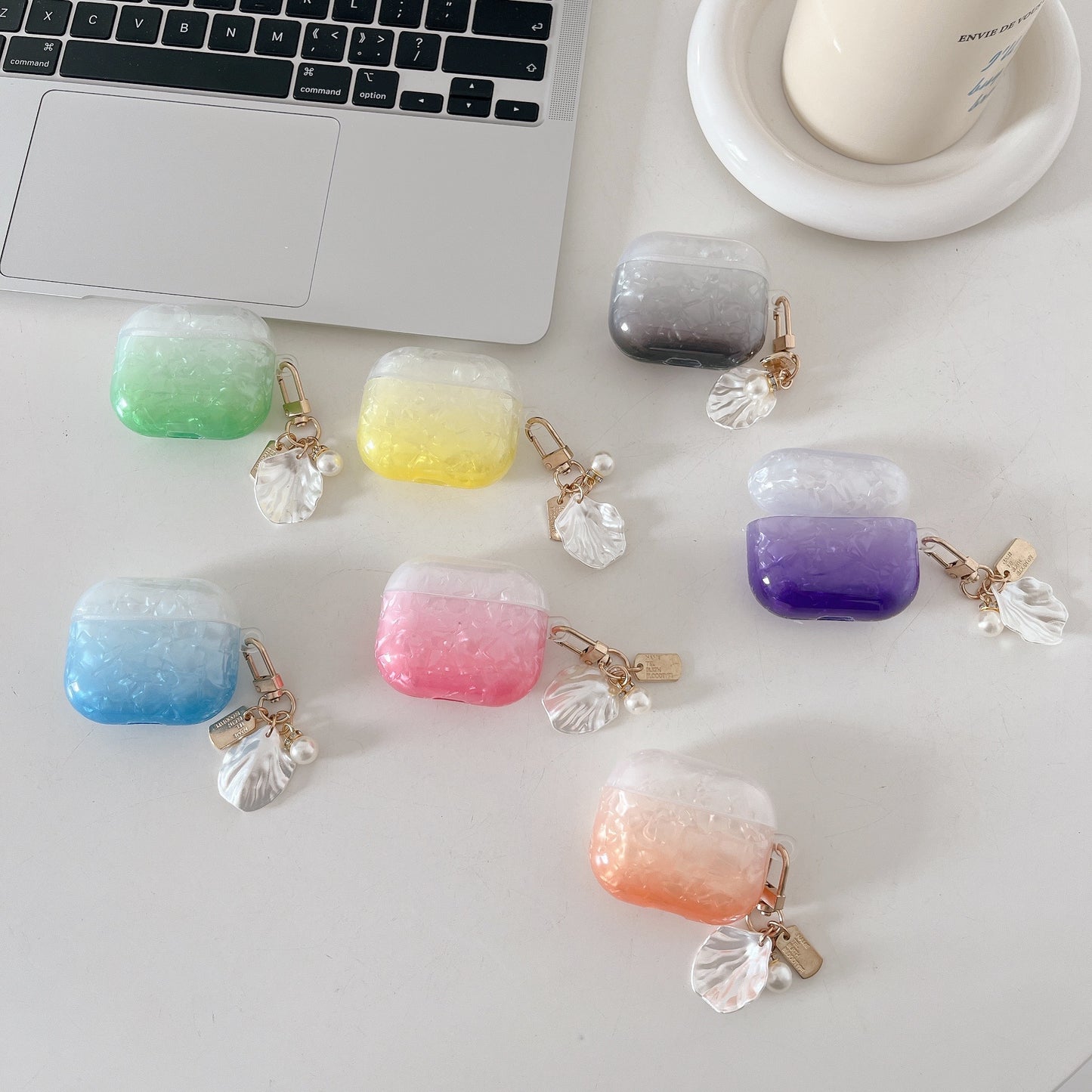 Uniqkart for AirPods Pro 2 Gradient Shell Grain TPU Case Shockproof Earphone Cover with Shell Shape Pendant - Orange