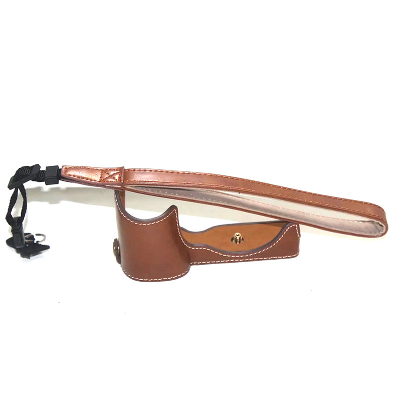 Uniqkart for Sony ZV-E10 Camera PU Leather Bottom Case Battery Opening Design Half Body Protective Cover with Hand Strap - Brown