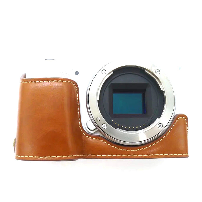 Uniqkart for Sony ZV-E10 Camera PU Leather Bottom Case Battery Opening Design Half Body Protective Cover with Hand Strap - Brown
