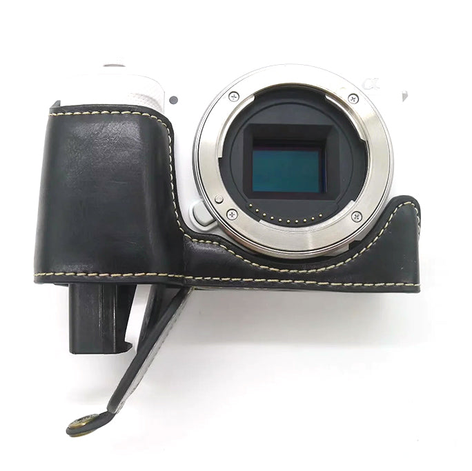 Uniqkart for Sony ZV-E10 Camera PU Leather Bottom Case Battery Opening Design Half Body Protective Cover with Hand Strap - Black