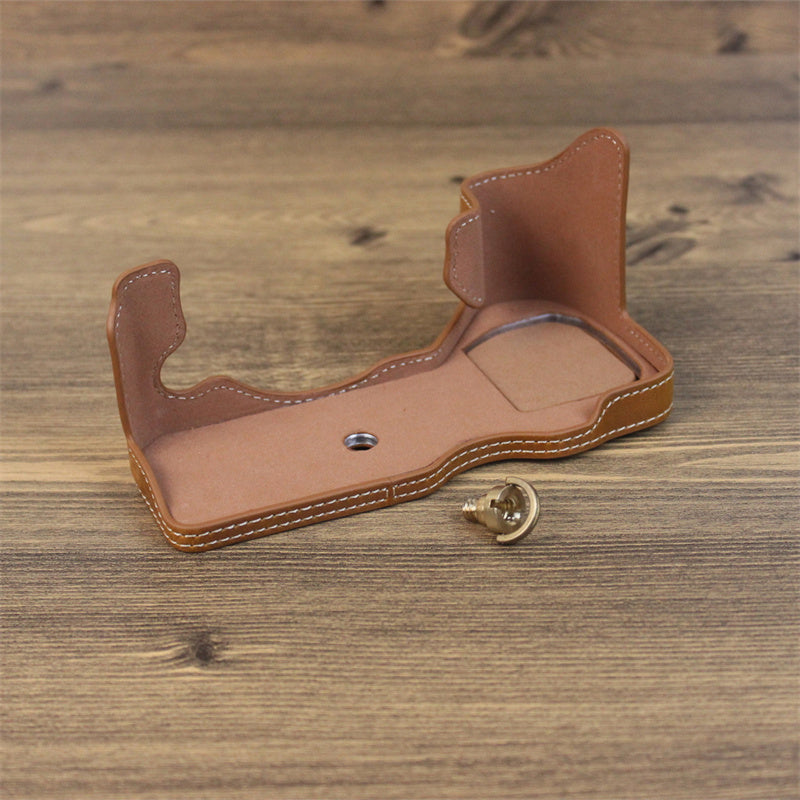 Uniqkart for Fujifilm X-H2s / X-H2 PU Leather Anti-scratch Camera Bottom Cover Large Opening Design Protective Half Body Case - Brown