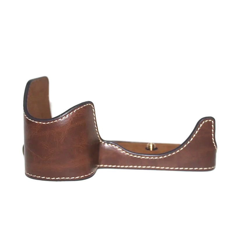 Uniqkart for Sony A6600 Anti-scratch PU Leather Camera Bottom Cover Battery Opening Design Half Body Protective Case with Hand Strap - Coffee