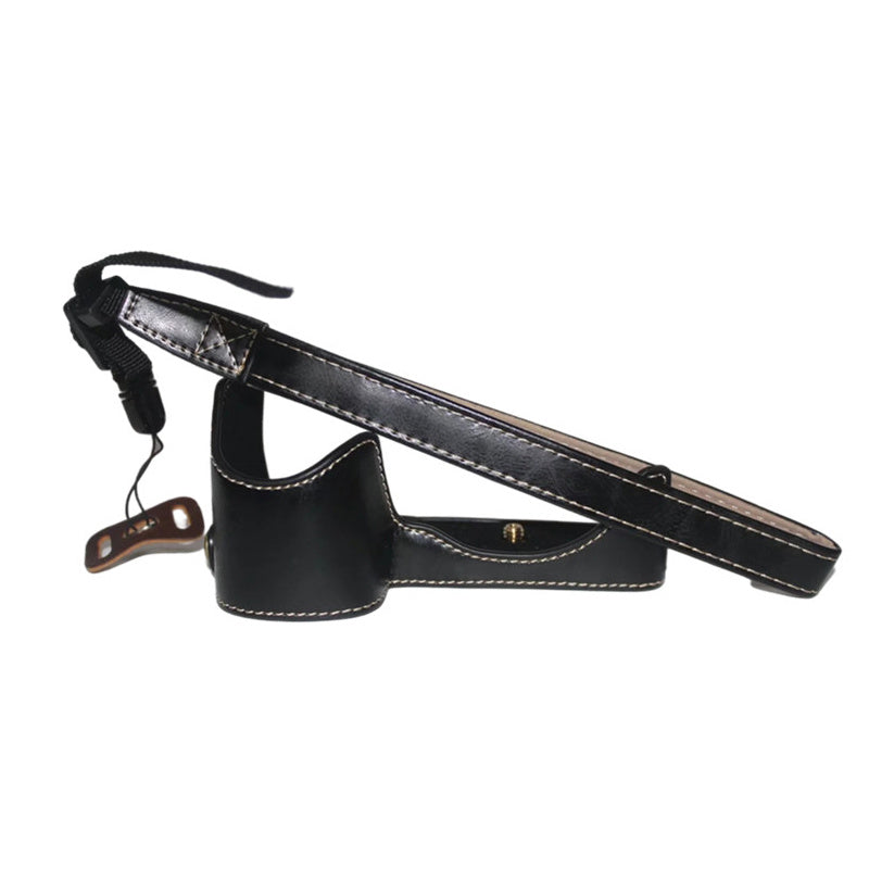 Uniqkart for Sony A6600 Anti-scratch PU Leather Camera Bottom Cover Battery Opening Design Half Body Protective Case with Hand Strap - Black