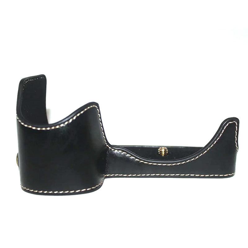 Uniqkart for Sony A6600 Anti-scratch PU Leather Camera Bottom Cover Battery Opening Design Half Body Protective Case with Hand Strap - Black