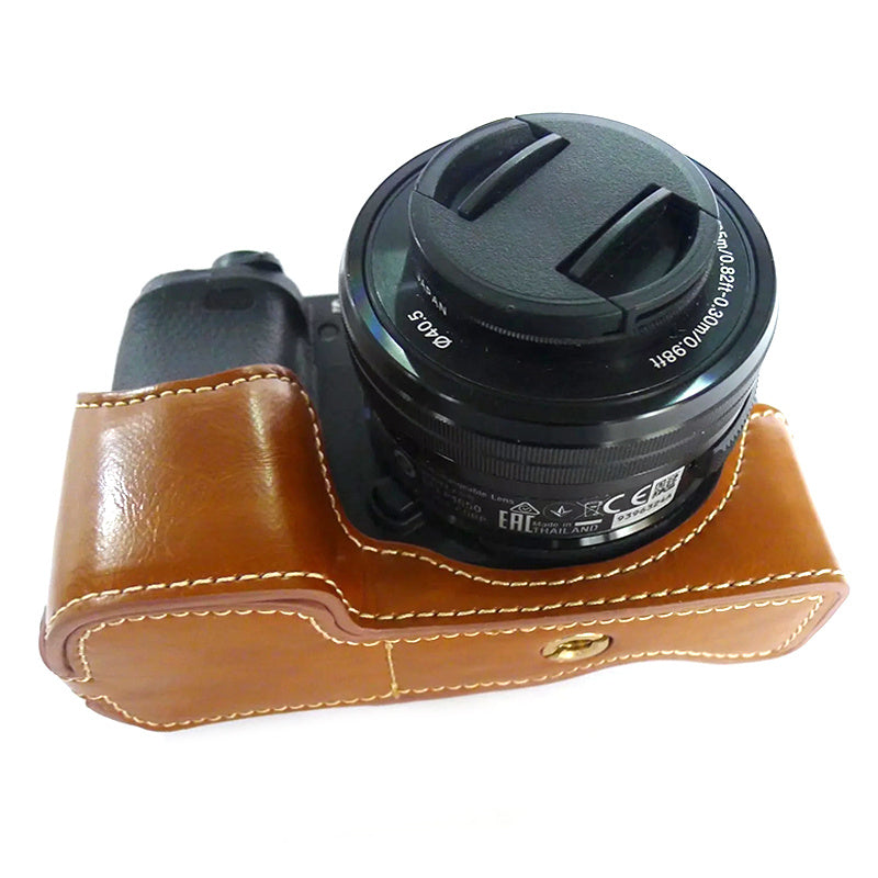 Uniqkart for Sony A6400 / A6300 / A6000 Battery Opening Bottom Case PU Leather Half Body Protective Cover with Hand Strap - Brown