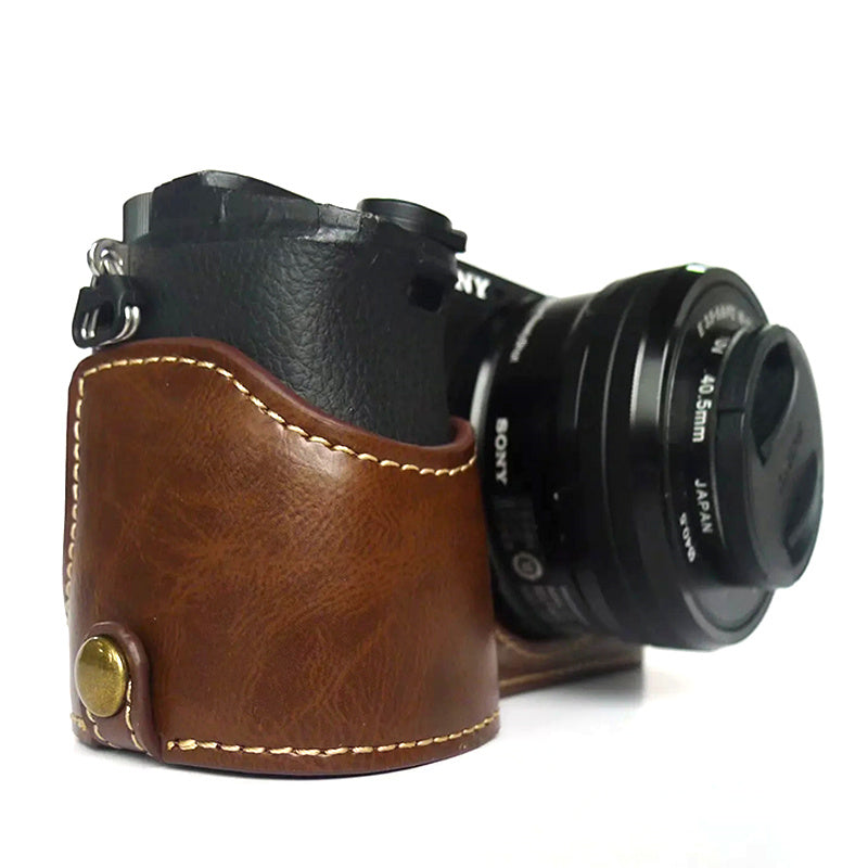 Uniqkart for Sony A6400 / A6300 / A6000 Battery Opening Bottom Case PU Leather Half Body Protective Cover with Hand Strap - Coffee