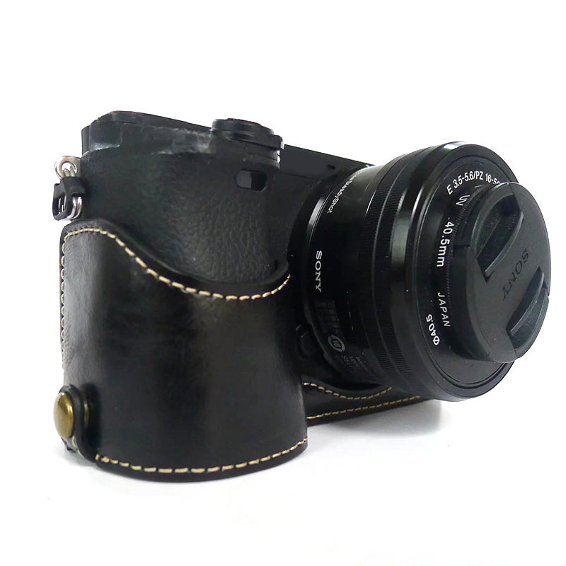 Uniqkart for Sony A6400 / A6300 / A6000 Battery Opening Bottom Case PU Leather Half Body Protective Cover with Hand Strap - Black