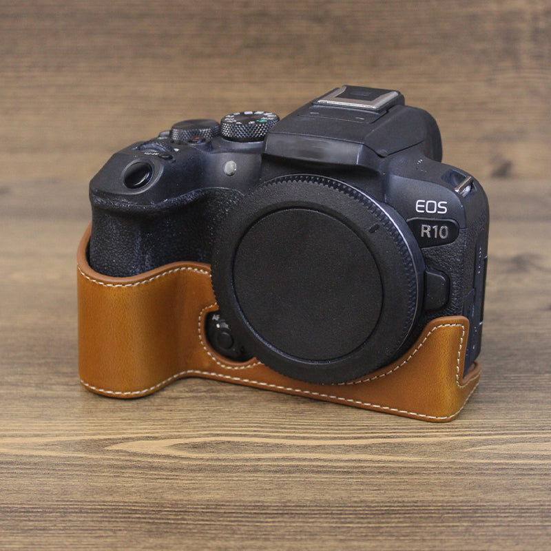 Uniqkart for Canon EOS R10 PU Leather Anti-scratch Camera Bottom Cover Large Opening Design Protective Half Body Case - Brown