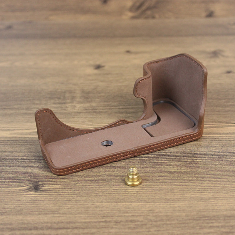 Uniqkart for Canon EOS R10 PU Leather Anti-scratch Camera Bottom Cover Large Opening Design Protective Half Body Case - Coffee