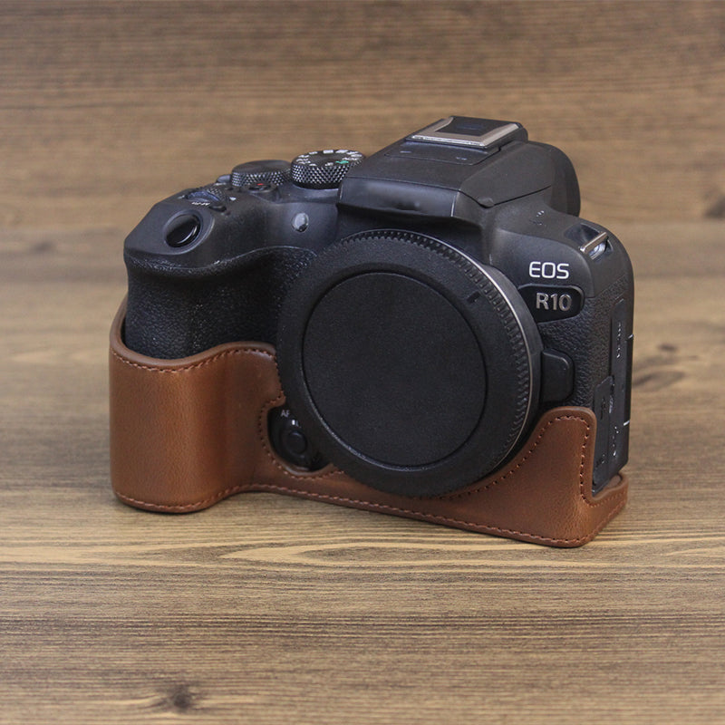 Uniqkart for Canon EOS R10 PU Leather Anti-scratch Camera Bottom Cover Large Opening Design Protective Half Body Case - Coffee