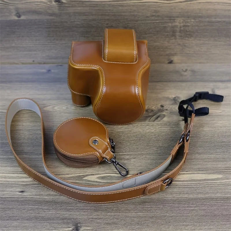 PU Leather Camera Case Bag for Canon EOS R10, Battery Opening Design Protective Cover with Lens Pouch and Strap - Brown