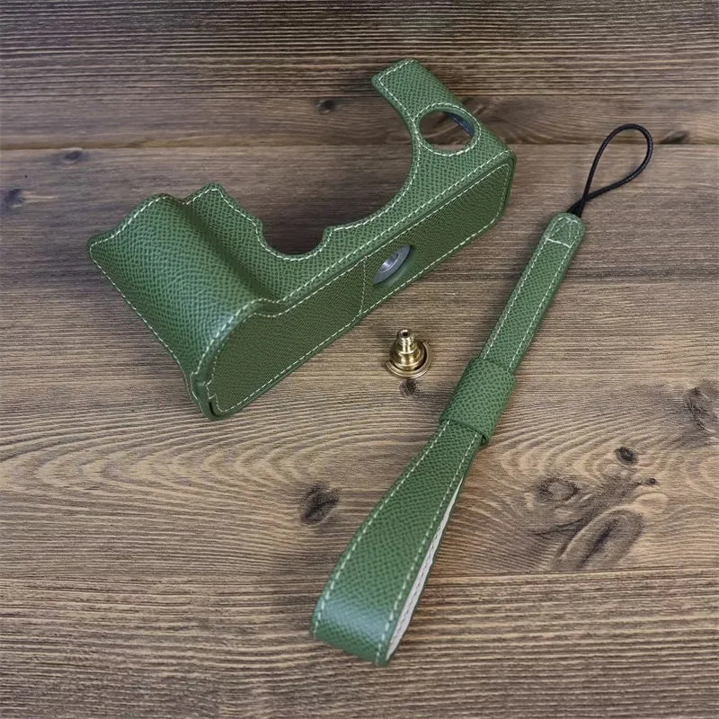 Uniqkart for Fujifilm X-T5 Camera PU Leather Protective Case Battery Opening Design Half Body Cover with Hand Strap - Green