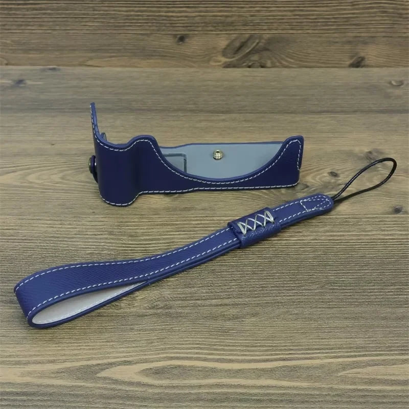 Uniqkart for Canon EOS R50 Anti-Shock PU Leather Camera Bottom Cover Large Opening Design Half Body Case with Strap - Blue