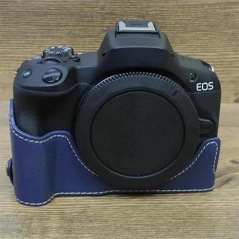 Uniqkart for Canon EOS R50 Anti-Shock PU Leather Camera Bottom Cover Large Opening Design Half Body Case with Strap - Blue