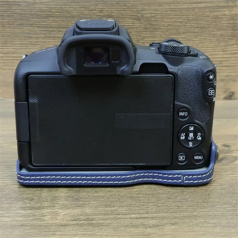 Uniqkart for Canon EOS R50 Anti-Shock PU Leather Camera Bottom Cover Large Opening Design Half Body Case with Strap - Blue
