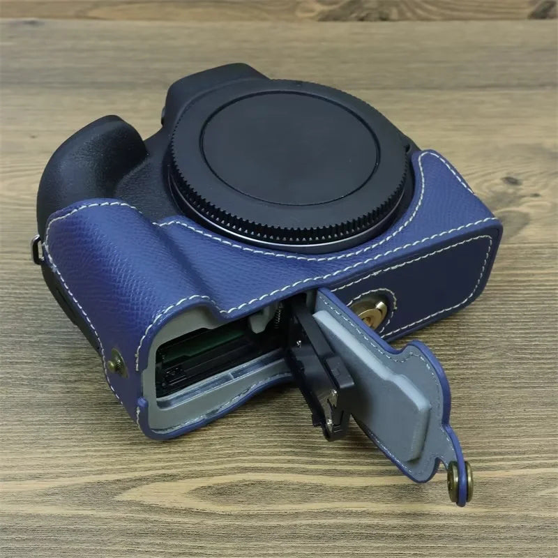 Uniqkart for Canon EOS R50 Anti-Shock PU Leather Camera Bottom Cover Large Opening Design Half Body Case with Strap - Blue