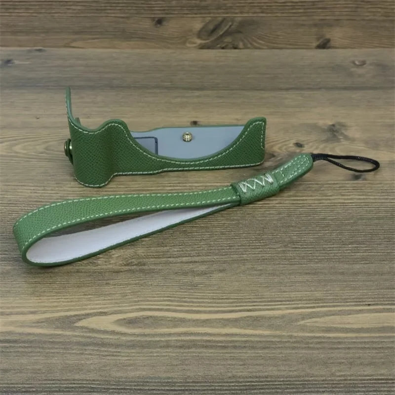 Uniqkart for Canon EOS R50 Anti-Shock PU Leather Camera Bottom Cover Large Opening Design Half Body Case with Strap - Green