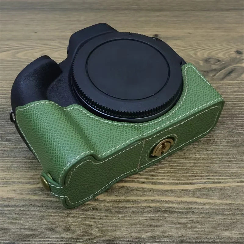 Uniqkart for Canon EOS R50 Anti-Shock PU Leather Camera Bottom Cover Large Opening Design Half Body Case with Strap - Green