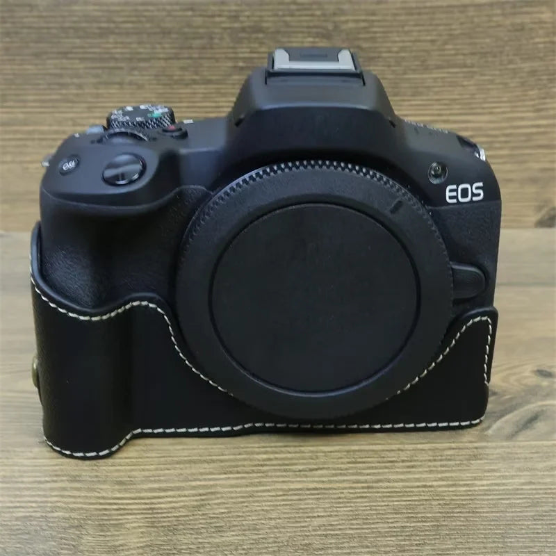 Uniqkart for Canon EOS R50 Anti-Shock PU Leather Camera Bottom Cover Large Opening Design Half Body Case with Strap - Black