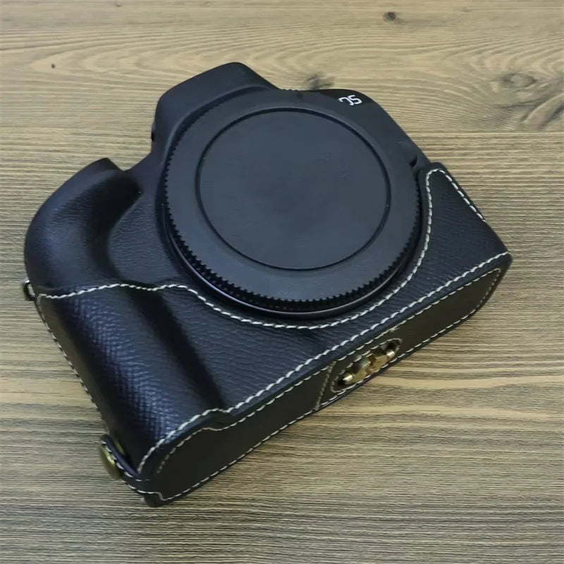 Uniqkart for Canon EOS R50 Anti-Shock PU Leather Camera Bottom Cover Large Opening Design Half Body Case with Strap - Black