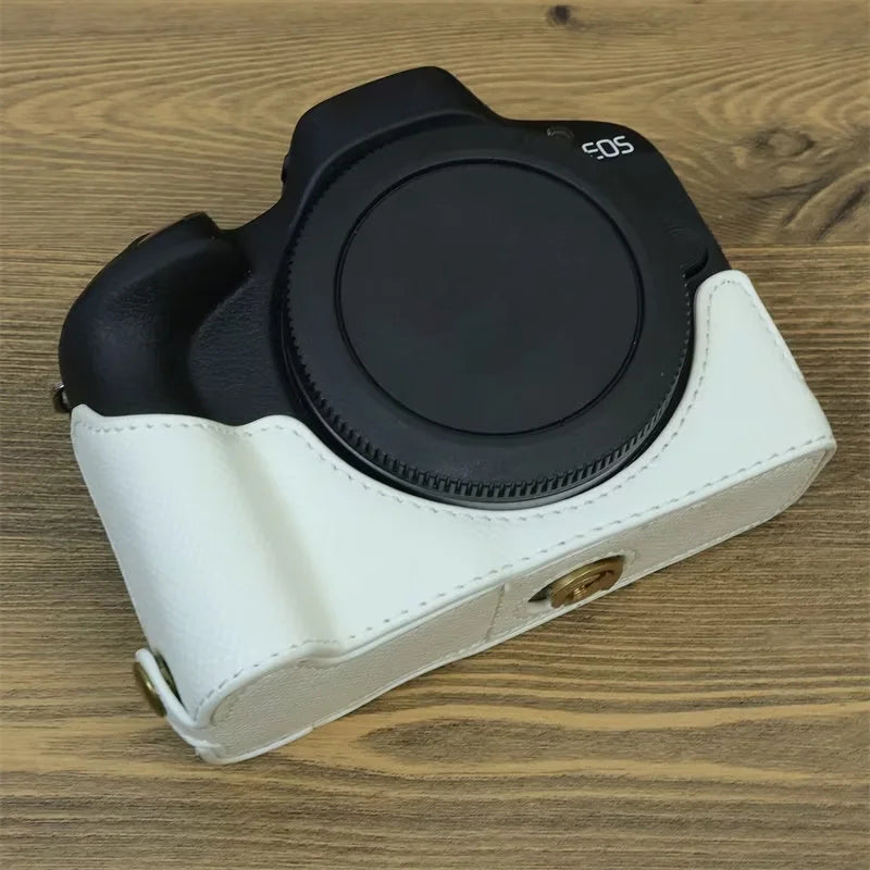 Uniqkart for Canon EOS R50 Anti-Shock PU Leather Camera Bottom Cover Large Opening Design Half Body Case with Strap - White