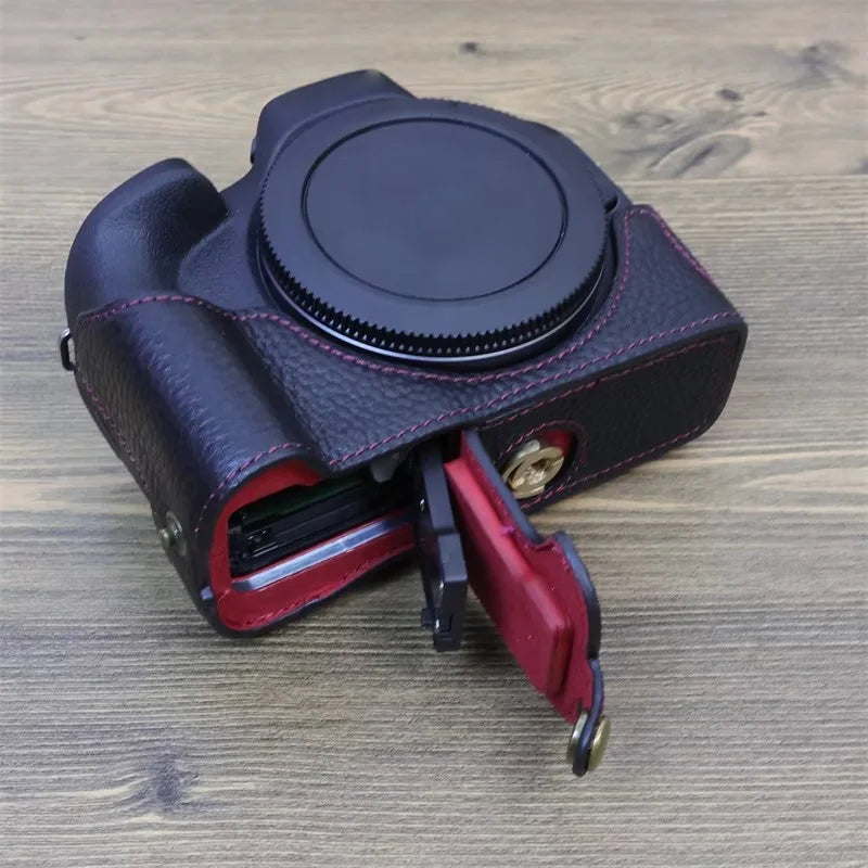Uniqkart for Canon EOS R50 Anti-scratch Genuine Leather Camera Bottom Cover Large Opening Design Half Body Case - Black