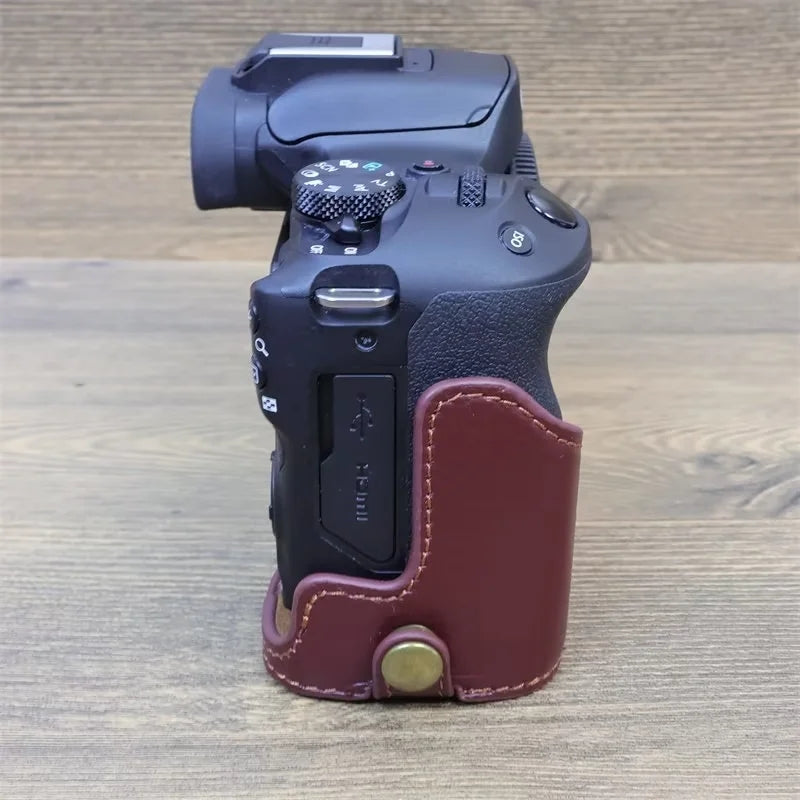 Uniqkart for Canon EOS R50 Anti-scratch Genuine Leather Camera Bottom Cover Large Opening Design Half Body Case - Coffee