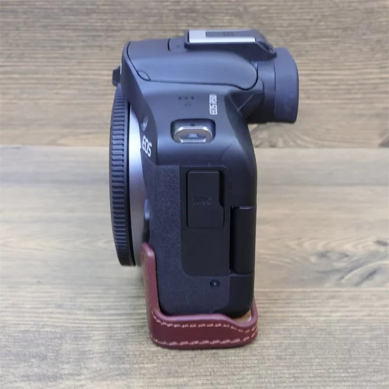 Uniqkart for Canon EOS R50 Anti-scratch Genuine Leather Camera Bottom Cover Large Opening Design Half Body Case - Coffee
