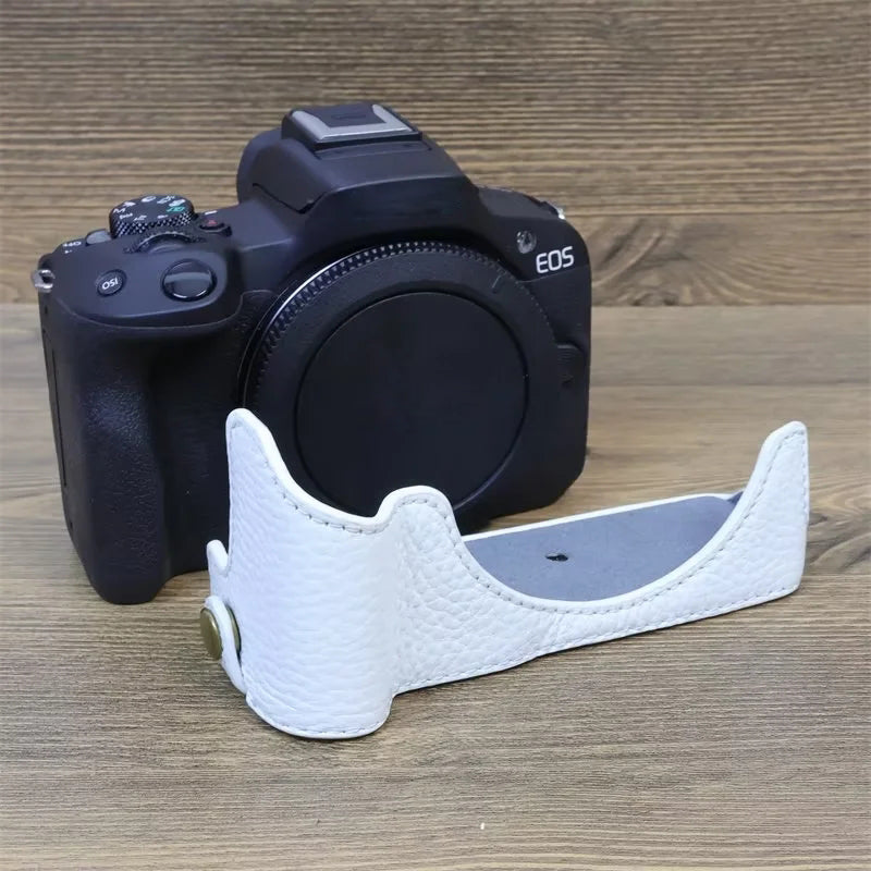 Uniqkart for Canon EOS R50 Anti-scratch Genuine Leather Camera Bottom Cover Large Opening Design Half Body Case - White