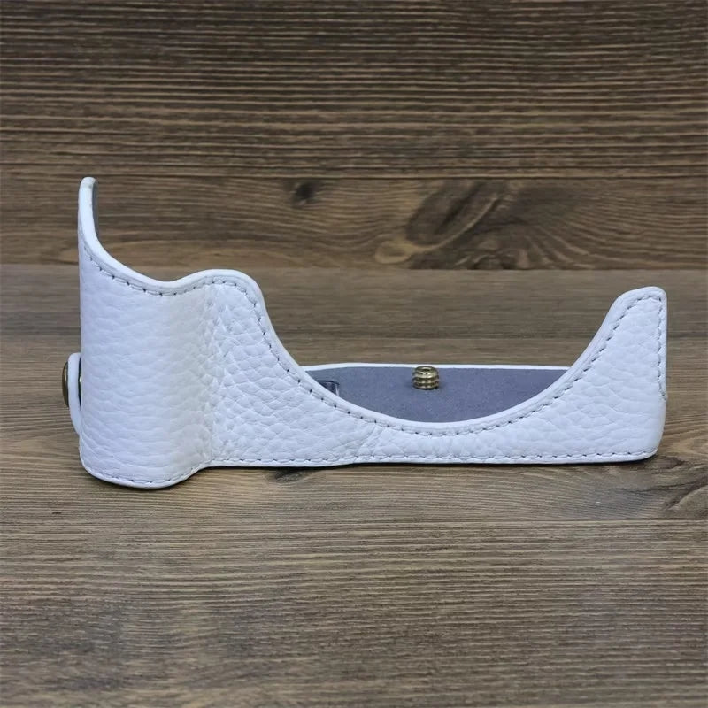 Uniqkart for Canon EOS R50 Anti-scratch Genuine Leather Camera Bottom Cover Large Opening Design Half Body Case - White