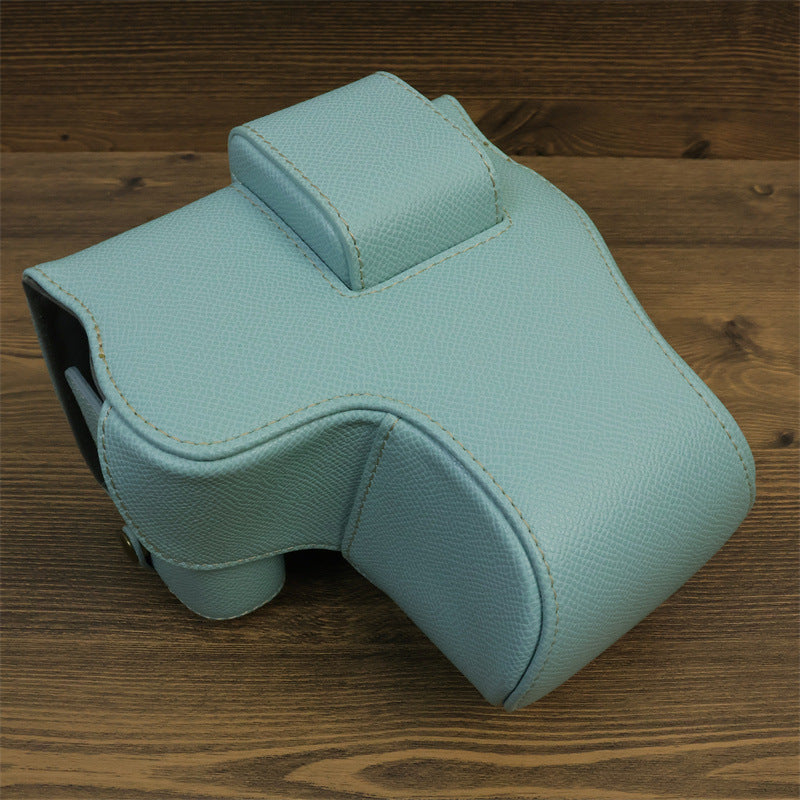 Uniqkart for Canon EOS R8 PU Leather Case Digital Camera Battery Opening Design Bag with Strap and Small Bag - Baby Blue