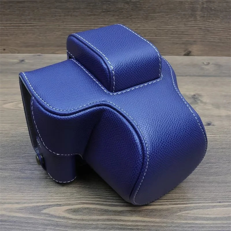 Uniqkart for Canon EOS R50 Camera Case Battery Opening Design Palm Texture Leather Bag with Strap and Small Bag - Dark Blue